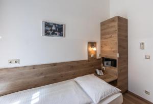 Postelja oz. postelje v sobi nastanitve Hotel Terminus