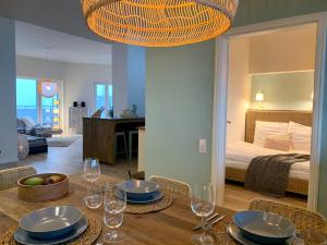 Ein Bett oder Betten in einem Zimmer der Unterkunft COAST HOUSE Sky Suite