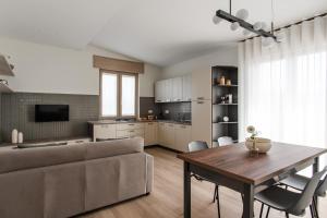 a living room with a couch and a table at Residenze Vesuviane - Pompei in Terzigno