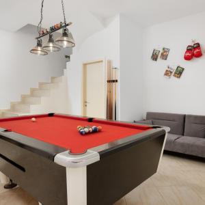 a living room with a pool table in front at Estia Project, Leisure - Billiards - Jacuzzi in Gournes