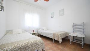 Postel nebo postele na pokoji v ubytování Casa Uly