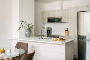 Köök või kööginurk majutusasutuses Sonder Le Guerin