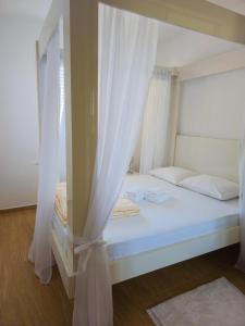 Ένα ή περισσότερα κρεβάτια σε δωμάτιο στο Boulevard Apartments