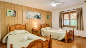 Posteľ alebo postele v izbe v ubytovaní Villa Josefina