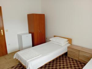 Postel nebo postele na pokoji v ubytování Adi