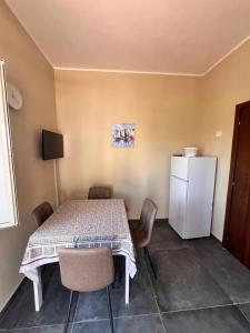 Kuchyň nebo kuchyňský kout v ubytování Appartamenti Minturnae Relais