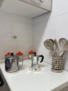 Kuchyň nebo kuchyňský kout v ubytování Appartamenti Minturnae Relais