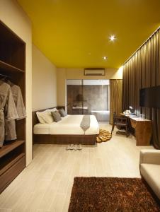 Hotel Yan客房内的一张或多张床位