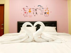 Postel nebo postele na pokoji v ubytování พัชรี รีสอร์ท ภูเก็ต Patcharee Resort Phuket