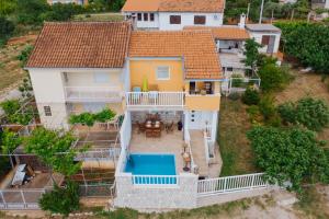 an aerial view of a house with a pool at Villa Wolf in Čapljina