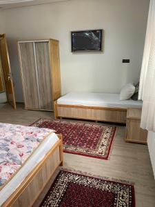 A bed or beds in a room at Jaddou Home