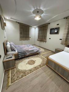 A bed or beds in a room at Jaddou Home