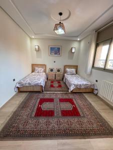 Postel nebo postele na pokoji v ubytování Jaddou Home