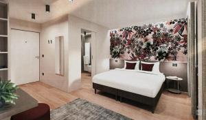 a bedroom with a large bed with a floral mural on the wall at Locanda Alla Porchetta in Negrar +9 photos