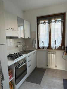 Kuchyň nebo kuchyňský kout v ubytování La Marisetta + 11 fotografií