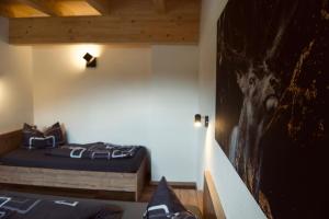 Posteľ alebo postele v izbe v ubytovaní Alpenliebe Pitztal