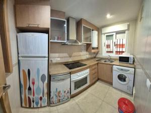 Kuchyň nebo kuchyňský kout v ubytování Apartamento 2ª Línea-Oropesa del Mar