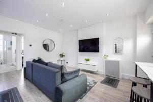 Et tv og/eller underholdning på WestPoint Luxury Apartment + 3 billeder