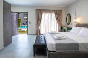 Krevet ili kreveti u jedinici u okviru objekta Villa Dimitris Apartments & Bungalows by Imagine Lefkada