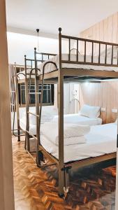 Ένα ή περισσότερα κρεβάτια σε δωμάτιο στο Jeune Hotel at Phra Singh