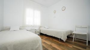 Postel nebo postele na pokoji v ubytování Casa Uly 2