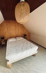 Postel nebo postele na pokoji v ubytování La Vachette