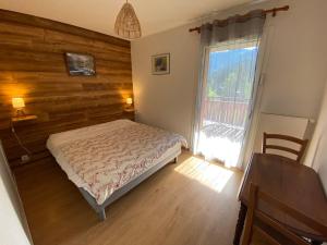 Posteľ alebo postele v izbe v ubytovaní Appartement contemporain, spacieux et lumineux, dans une résidence calme à Châtel, proche des pistes! - FR-1-693-84