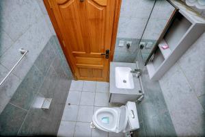 Phòng tắm tại Kigali Wings Apartment 1 +16 ảnh