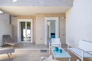 Posezení v ubytování Su Mari Rooms