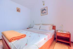 Postel nebo postele na pokoji v ubytování VILLA JELA