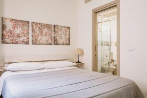 Siracusa Casa Tiche & Selene客房内的一张或多张床位