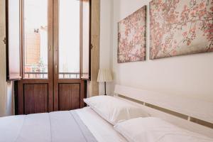 Siracusa Casa Tiche & Selene客房内的一张或多张床位