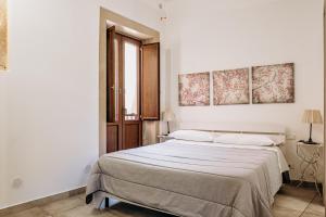 Siracusa Casa Tiche & Selene客房内的一张或多张床位