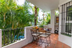 Balkón nebo terasa v ubytování AB Properties - Design Penthouse Marbella - Puerto Banús - Golden Mile - Pool and Tropical Garden View