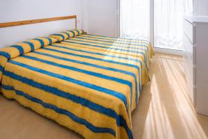Postel nebo postele na pokoji v ubytování Apartments Sorrabona