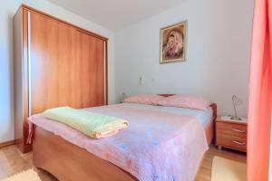 Postel nebo postele na pokoji v ubytování VILLA JELA