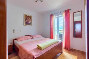 Postel nebo postele na pokoji v ubytování VILLA JELA