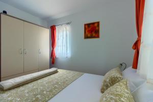Postel nebo postele na pokoji v ubytování VILLA JELA