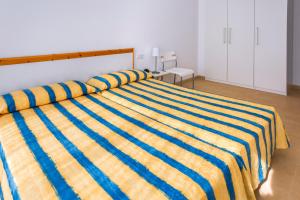 Postel nebo postele na pokoji v ubytování Apartments Sorrabona