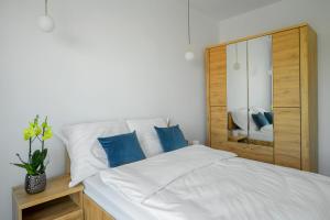 Ένα ή περισσότερα κρεβάτια σε δωμάτιο στο Apartament Sonata