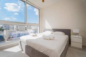 Postel nebo postele na pokoji v ubytování NEW 2BR Townhouse in Luxury Resort Pool & Beach + 52 fotografií