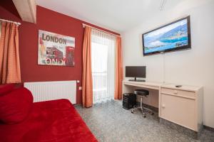 Μια τηλεόραση ή/και κέντρο ψυχαγωγίας στο Appartement Gimpl