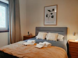 Ένα ή περισσότερα κρεβάτια σε δωμάτιο στο Casa das Essências, Quinta de Santo António