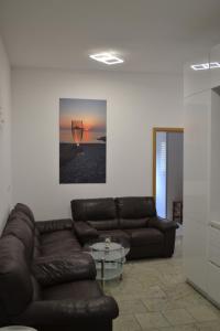 Villa Baldi -Apartmani Danny的休息区