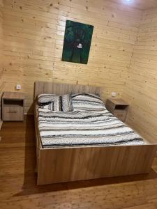 Postel nebo postele na pokoji v ubytování Brvnara kamenjar