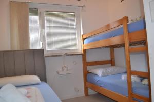 Villa Baldi -Apartmani Danny客房内的一张或多张床位