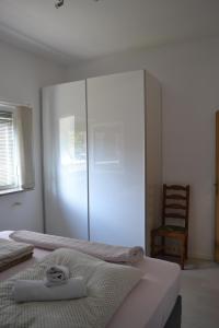 Villa Baldi -Apartmani Danny客房内的一张或多张床位
