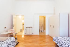 Posteľ alebo postele v izbe v ubytovaní Park Guest House By Blueapartments