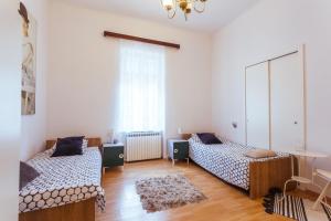 Posteľ alebo postele v izbe v ubytovaní Park Guest House By Blueapartments