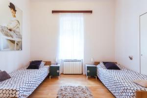 Posteľ alebo postele v izbe v ubytovaní Park Guest House By Blueapartments